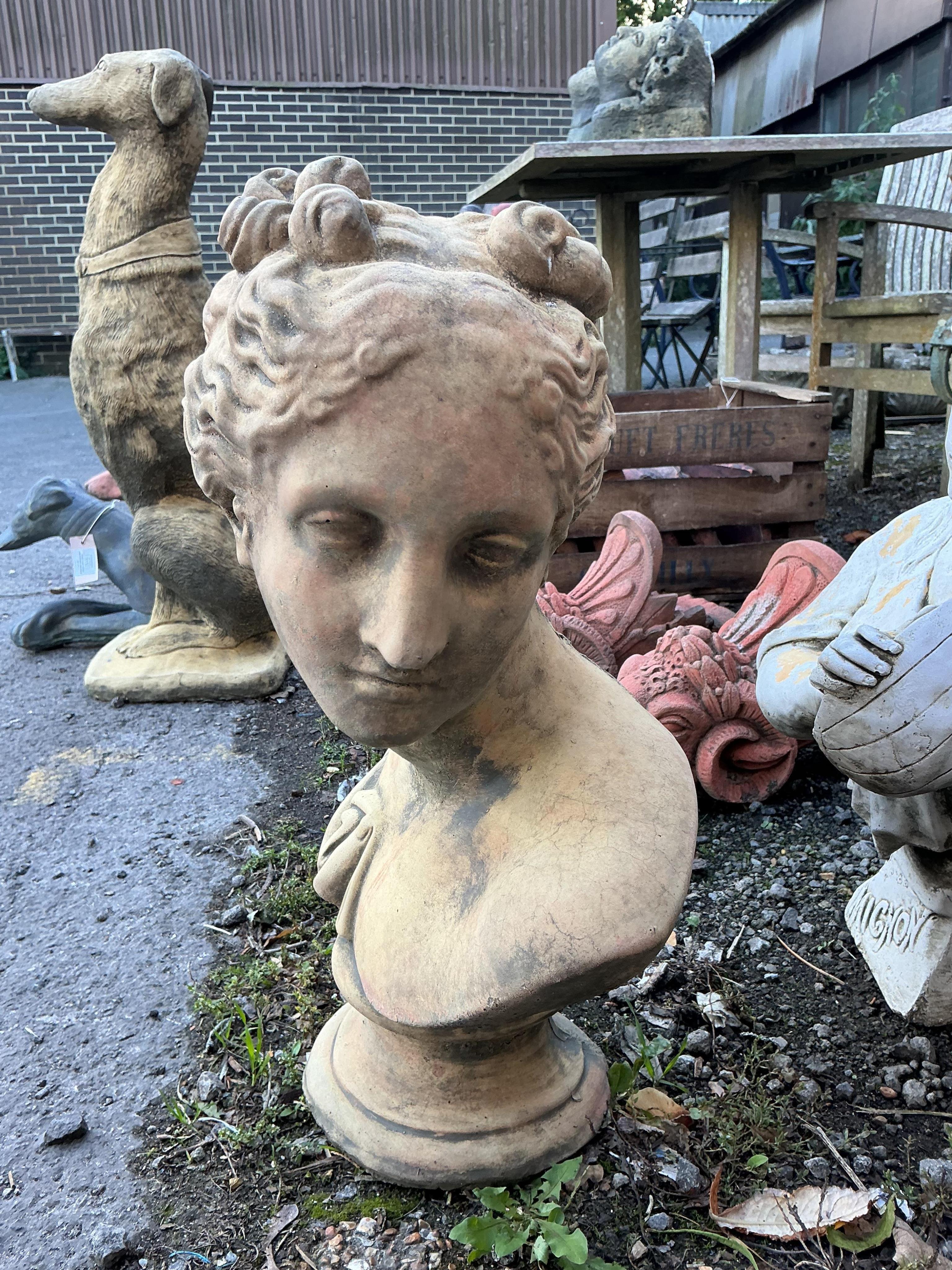 Three stone classical female busts, largest height 52cm